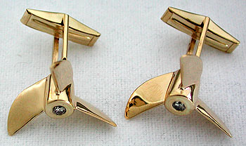 cleaver pitch propeller cufflinks with .10 carat diamonds