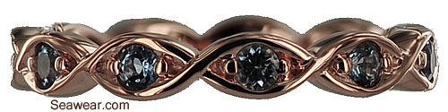 14kt rose gold band wit aquamarine gemstones