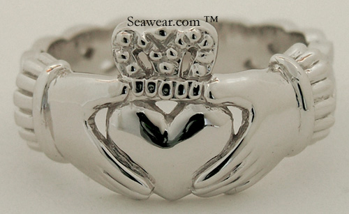 mans Claddagh ring with Celtic knots