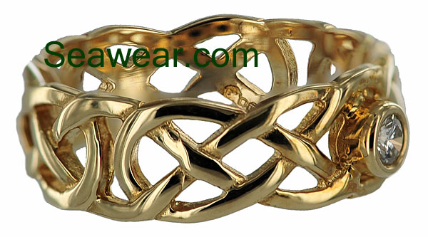 14kt celtic engagement ring showing bezel mounted .15ct diamond
