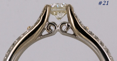 VS to VVS1 floating diamond engagement ring