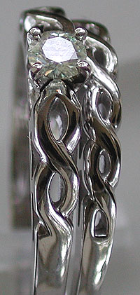 white gold celtic weave ring set with moissanite gemstone