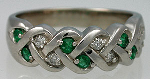 white gold emerald and diamonds Celtic engagement ring