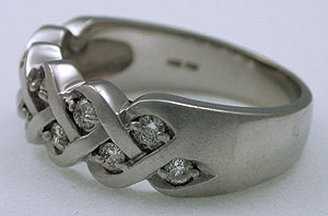 side view showing satin finish around diamonds