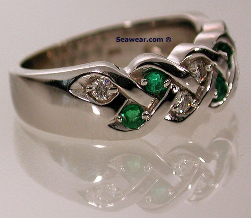 Celtic weave ring with alternating emeralds and diamonds