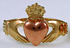 childs claddagh ring with rose heart