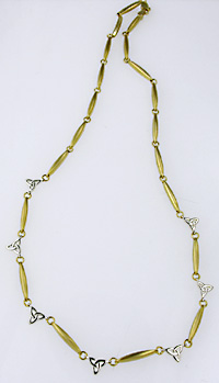 14k trinity knot and ogham bar necklace in white and yellow gold