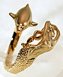 gold mermaid and dolphin ring by Stephen Douglas