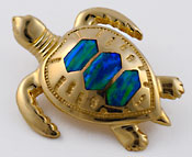 sea turtle slide with opal inlay