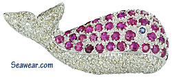 18kt whale brooch with diamonds, rubies and sapphire