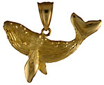 14kt whale pendant with detailed side and barnacles